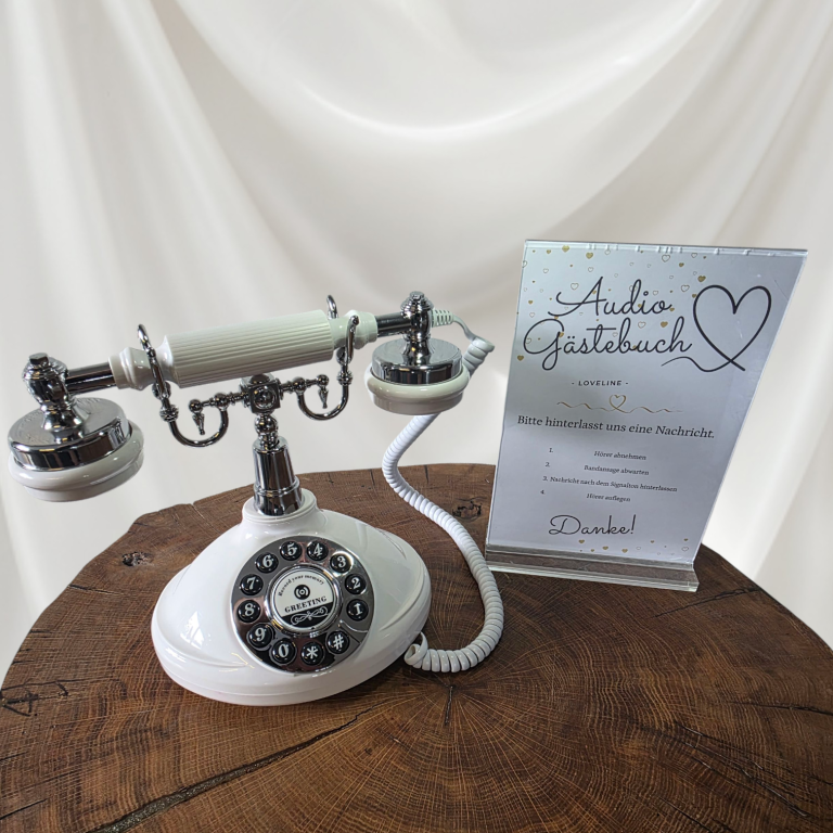 Vintage weiße Telefon mit drehbarem Wählscheibe und Dekorationskarte.